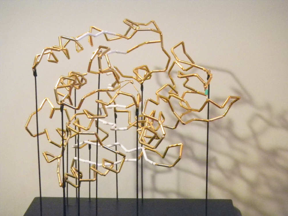 Desktop gold-plated
          brass model of carboxypeptidase